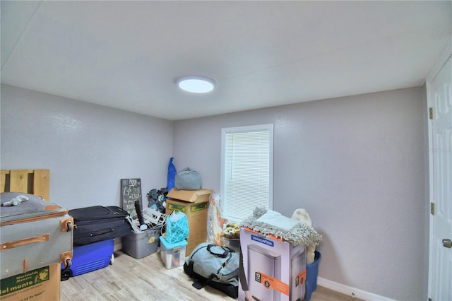 bedroom with light hardwood / wood-style flooring