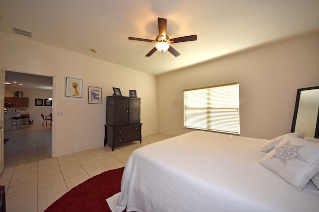 bedroom with light tile patterned floors and ceiling fan