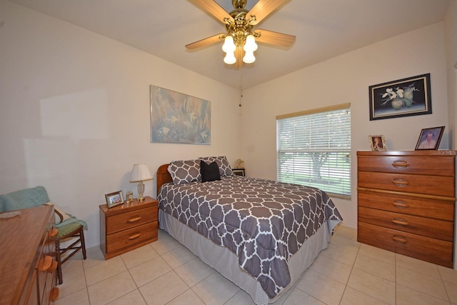 bedroom featuring ceiling fan and light tile patterned flooring