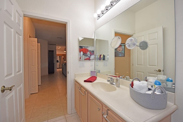 bathroom featuring vanity and tile patterned flooring