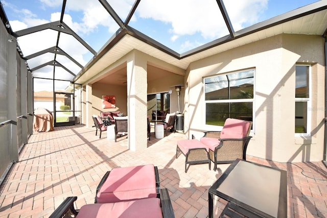 view of patio with a lanai