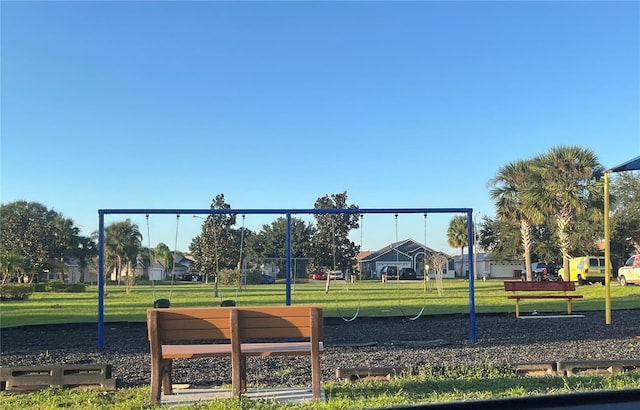 view of play area featuring a lawn