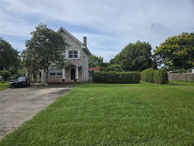 view of front of house with a front lawn