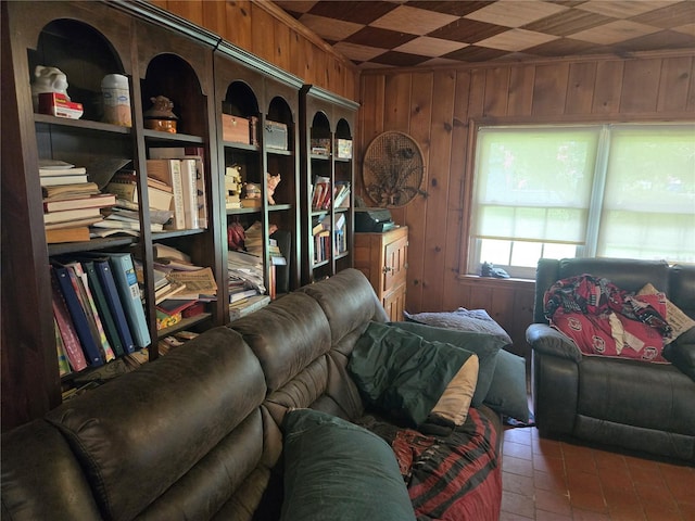 living room with wood walls