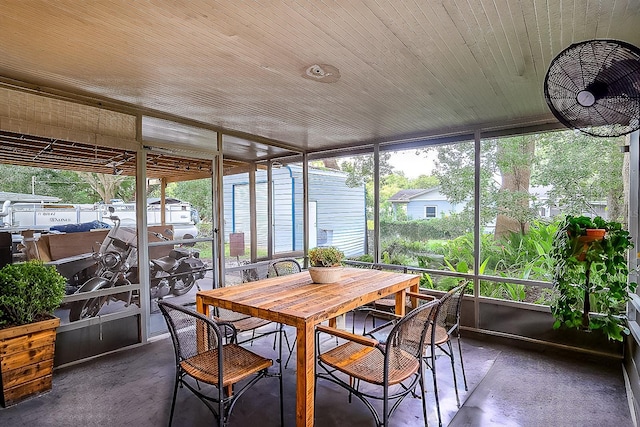 sunroom featuring wooden ceiling