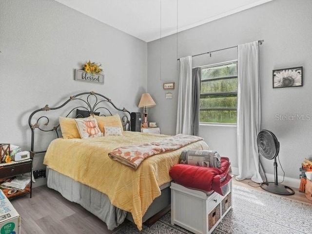 bedroom featuring light hardwood / wood-style floors