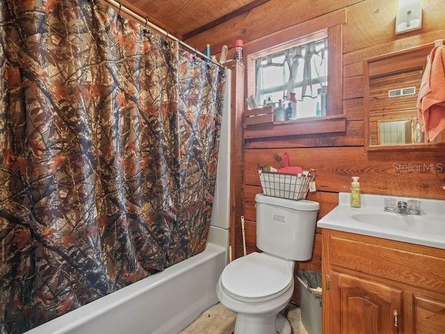 full bathroom with shower / bathtub combination with curtain, wooden walls, vanity, and toilet