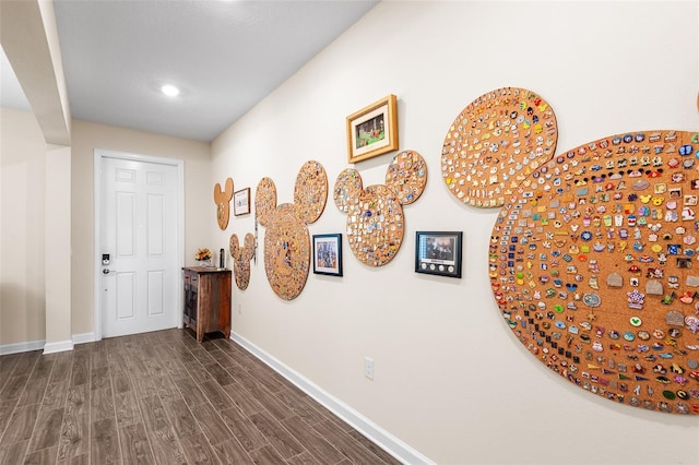 hallway featuring dark hardwood / wood-style floors