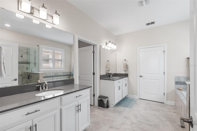 bathroom with vanity, plus walk in shower, and tile patterned floors