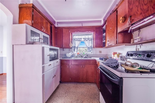 kitchen featuring black microwave, sink, and white electric range oven