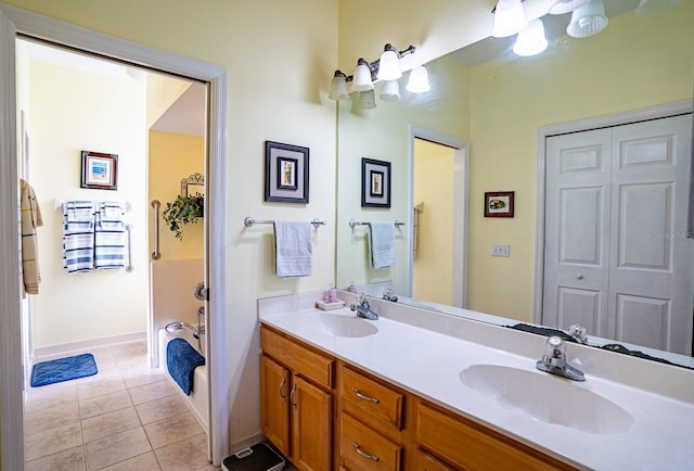 bathroom featuring tile patterned flooring and vanity