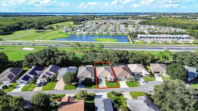 birds eye view of property featuring a water view