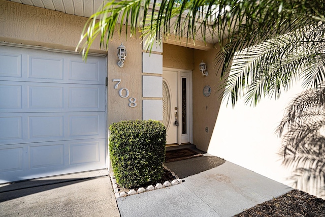 property entrance featuring a garage