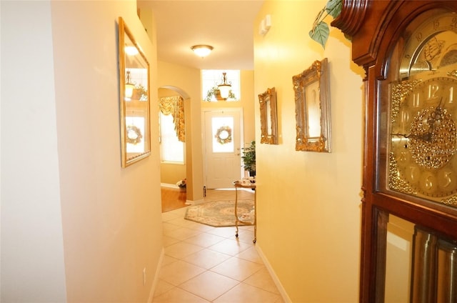 hallway with light tile patterned floors