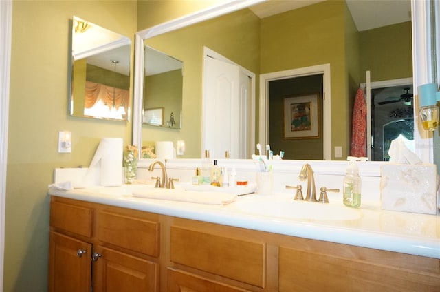 bathroom featuring vanity and ceiling fan