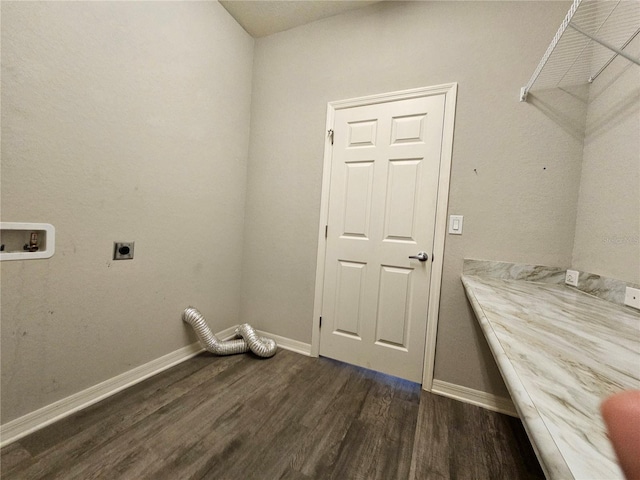 laundry room featuring washer hookup, dark wood-type flooring, and hookup for an electric dryer