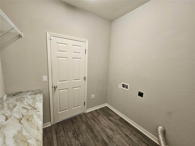 clothes washing area with dark hardwood / wood-style floors, a textured ceiling, hookup for an electric dryer, and washer hookup