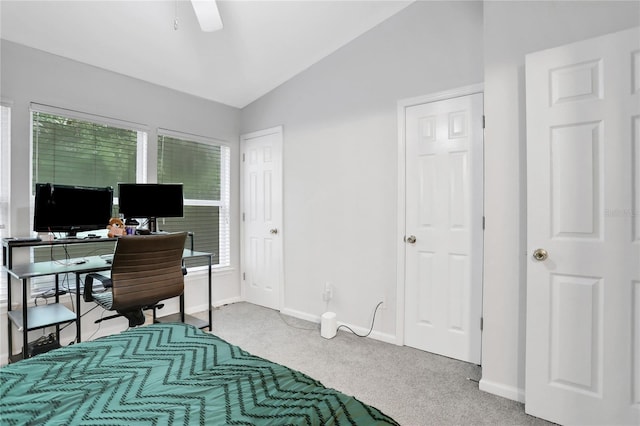 interior space featuring lofted ceiling and ceiling fan