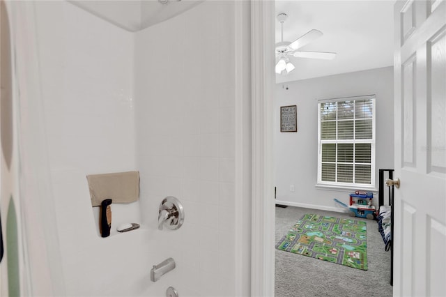 bathroom with ceiling fan and a shower