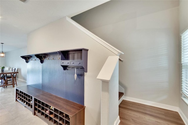 mudroom with hardwood / wood-style flooring