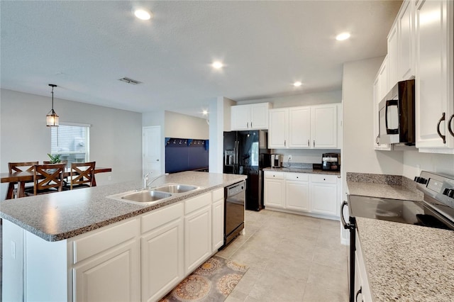 kitchen with a center island with sink, sink, white cabinetry, and black appliances