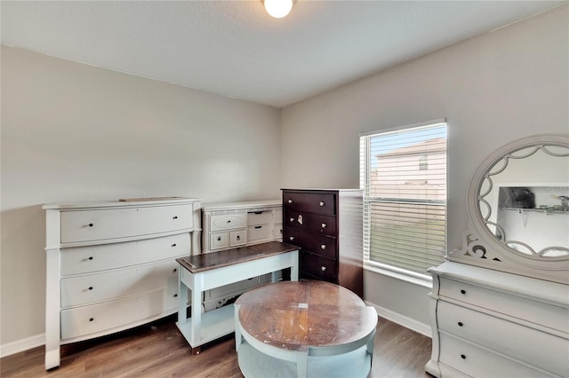 living area with dark hardwood / wood-style flooring