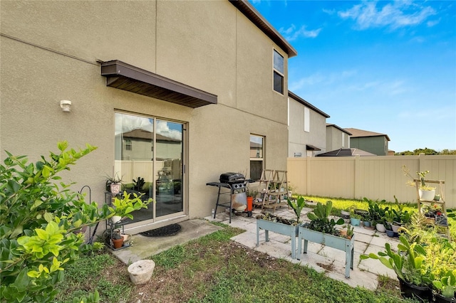 rear view of property with a patio