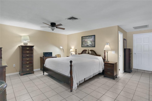 bedroom with ceiling fan and light tile patterned floors