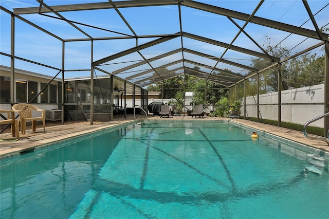 view of pool featuring a lanai and a patio area