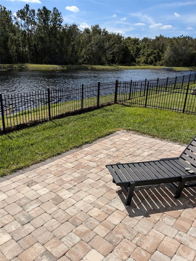 view of patio featuring a water view