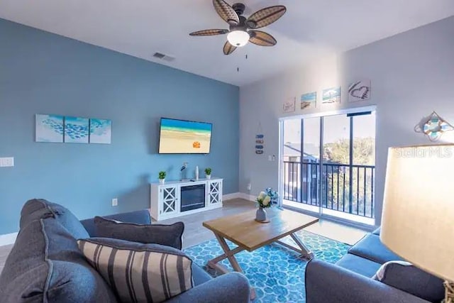 living room with ceiling fan