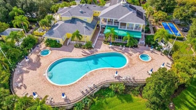 view of swimming pool featuring a patio