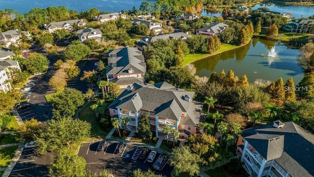 drone / aerial view with a water view