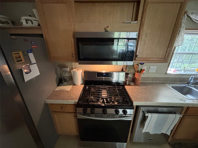 kitchen featuring sink and appliances with stainless steel finishes