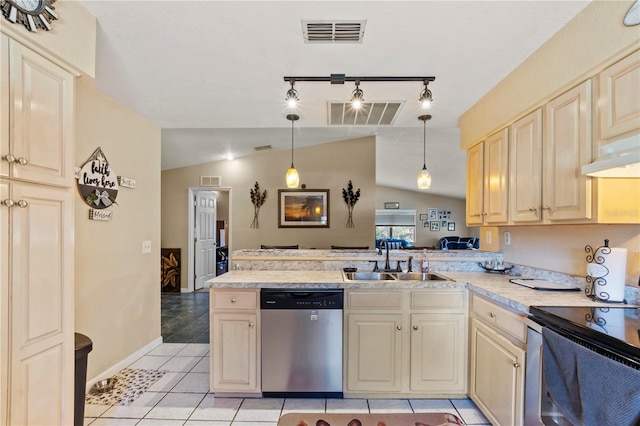 kitchen with appliances with stainless steel finishes, lofted ceiling, pendant lighting, and sink