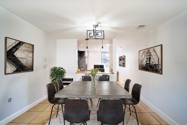 dining room featuring light tile patterned flooring