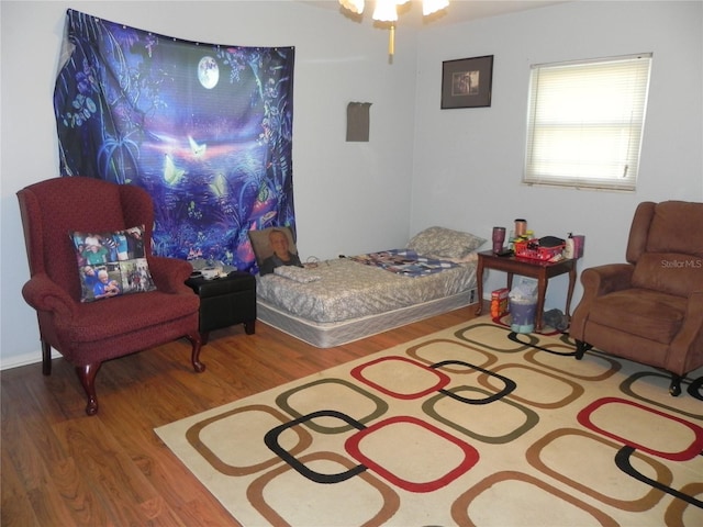 bedroom with wood finished floors