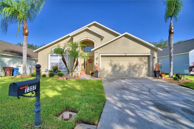 single story home with a front lawn and a garage