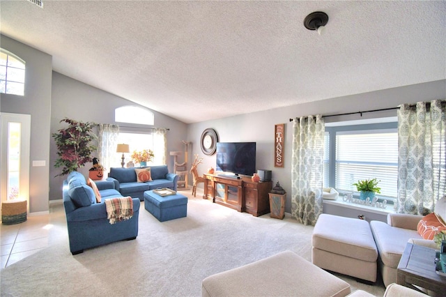 living room with vaulted ceiling, light carpet, and a textured ceiling