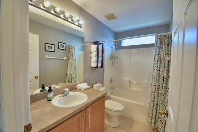 full bathroom featuring toilet, shower / bath combo, vanity, and tile patterned flooring