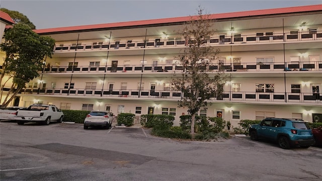 view of outdoor building at dusk