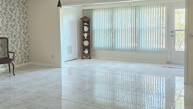 view of tiled spare room