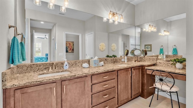 bathroom with hardwood / wood-style floors and vanity