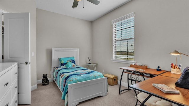 carpeted bedroom featuring ceiling fan