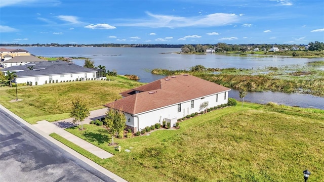 aerial view featuring a water view