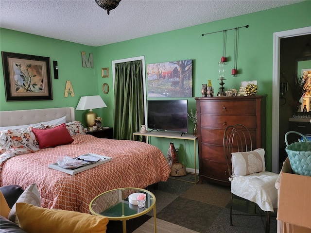 bedroom featuring a textured ceiling