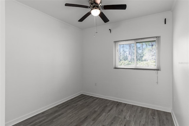 unfurnished room with crown molding, dark hardwood / wood-style flooring, and ceiling fan