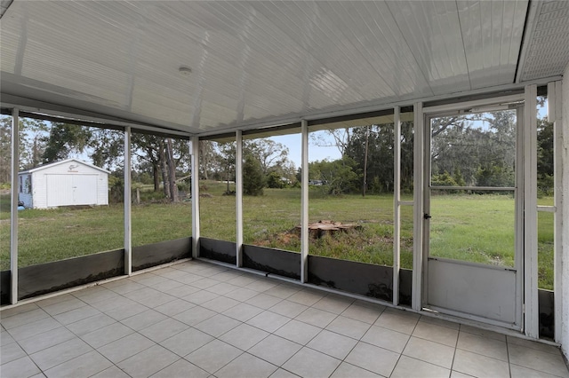 unfurnished sunroom with plenty of natural light