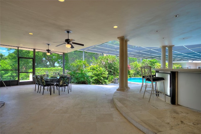 view of patio / terrace featuring ceiling fan