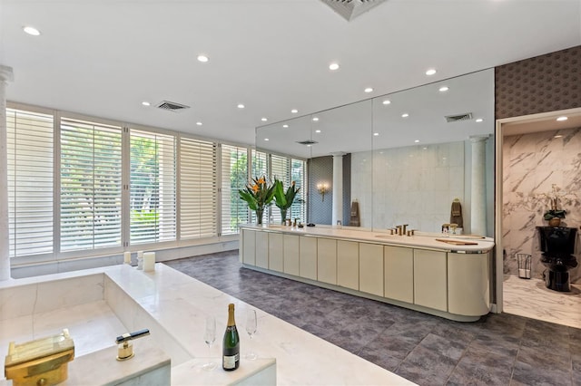 reception area featuring decorative columns